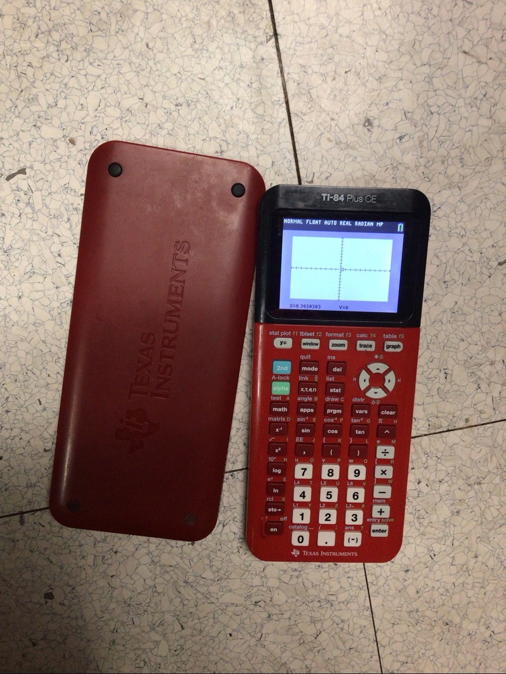 Texas Instruments TI-84 Plus CE Graphing Calculator with charging cable. Working